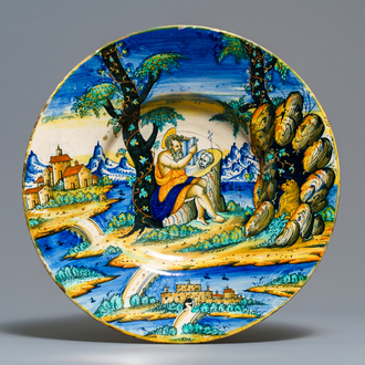 A large Italian maiolica dish depicting 'The penitence of Saint Jerome', Urbino or Venice, mid 16th C.